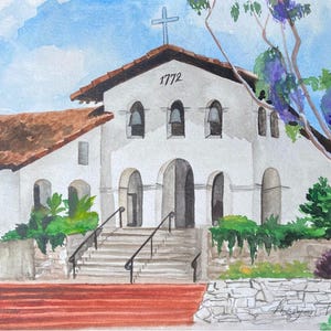 May include: A watercolour painting of a white building with a brown tiled roof. The building has a large arched doorway and several windows. The year 1772 is written above the doorway. There are trees and bushes in the foreground.