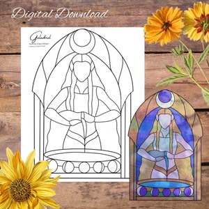 May include: A black and white line drawing of a stained glass window design featuring a woman with long hair holding a cup. The design includes a crescent moon and a circle with smaller circles inside. The image also includes a colored version of the design.