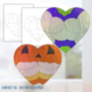May include: Two heart-shaped stained glass decorations. One is orange and yellow with a jack-o'-lantern face. The other is green, purple, and white with a swirl pattern.  The text "FOREVER ROSENFELD" is at the bottom of the image.
