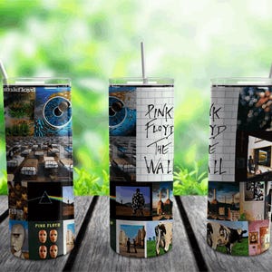 May include: Three stainless steel tumblers with a Pink Floyd "The Wall" design. The tumblers feature images from the album cover and the band's name.