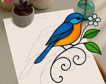 May include: A stained glass bird with blue, orange, and green accents perched on a black metal branch with a white flower. The bird is sitting on a white sheet of paper with a numbered pattern.