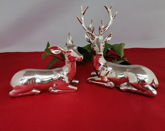 Deer "Framo", lying, with or without antlers, made of synthetic resin, silver-colored