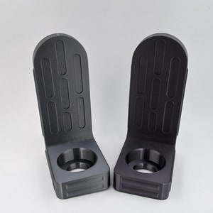 Lightsaber wall mount brackets, 3D printed in high detail PLA Plastic, Star Wars themed to hold and protect your saber while hanging on your wall for display . Available in majority colors and will fit majority of lightsabers on the market today .