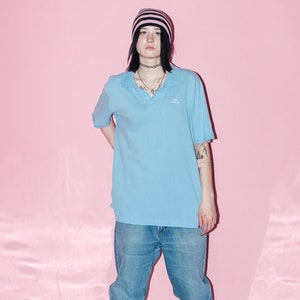 90's Vintage oversized classy polo t-shirt in baby blue image 1