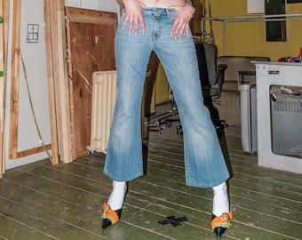 Vintage Y2K mid-rise flare jeans in medium wash