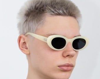 Y2K oval cateye sunglasses in cream yellow & black