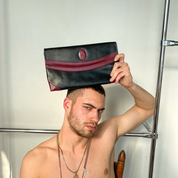 Vintage YSL black leather clutch bag