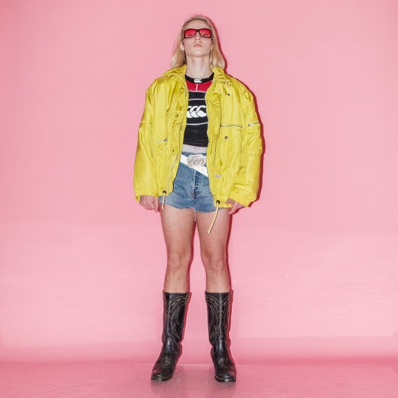 Yellow windbreaker shop from pink