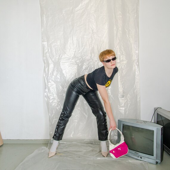 Vintage black leather side button trousers / 1990s