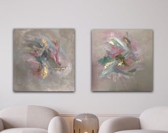 May include: Two abstract paintings with a gray background and colorful brushstrokes. The paintings feature gold accents and a soft, ethereal feel.