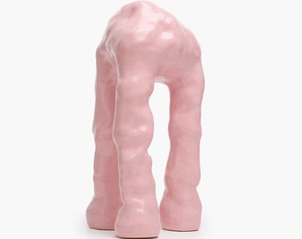 Glossy pink ceramic decorative figurine