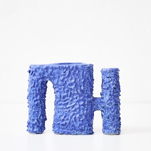 Hand-built blue vase with rough texture image 1