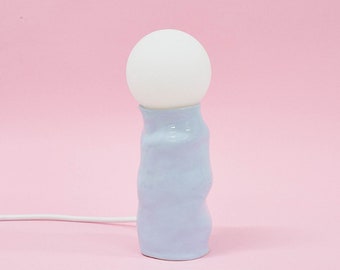 Small hand-built ceramic blue glossy lamp
