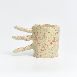 Hand-built irregular ceramic mug