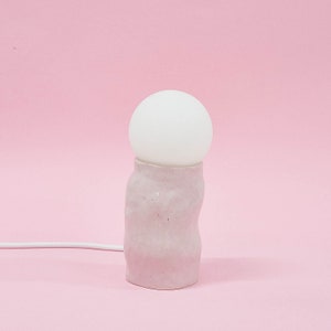 Small hand-built ceramic pink glossy lamp