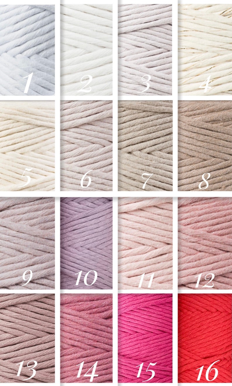May include: A collection of 16 spools of cotton cord in various shades of white, beige, pink, and red. The spools are arranged in a grid pattern.