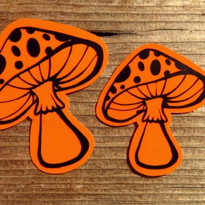 Trippy mushroom sticker, neon orange