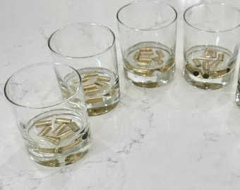 4 whiskey glasses w real brass shell bullet casings cast in resin. Great gift for hunters, whiskey lovers. Unique gift for dad, husband