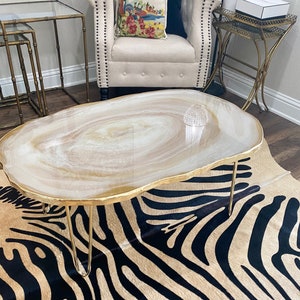 Luxury Resin geode coffee table, white and gold decorative table with gold hairpin legs. Custom colors available. Approx 40”x25”x 17+” high.