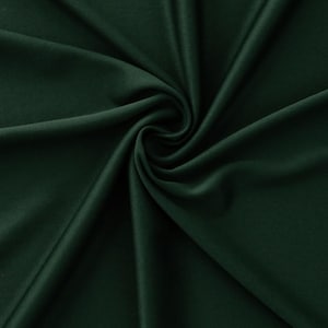 May include: Close-up of a dark green fabric with soft folds and a smooth texture. The fabric is a deep, rich shade of green, with subtle variations in tone due to the folds. The image highlights the fabric's drape and sheen.