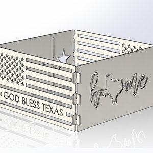May include: A metal fire pit with a cutout design of the American flag, the state of Texas, and the words "home" and "God Bless Texas".
