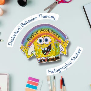 May include: A holographic sticker featuring a smiling yellow cartoon character with a rainbow above its head. The sticker has the text "Radical Acceptance" and "Dialectical Behavior Therapy". The words "Holographic Sticker" are also present.