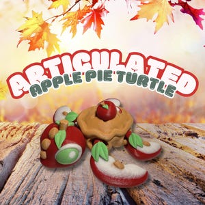 May include: A whimsical, articulated turtle figurine made of pie crust and apple slices. The turtle has a pie crust body, apple slice legs, and a red apple head. The text "ARTICULATED APPLE PIE TURTLE" arches above the figurine.