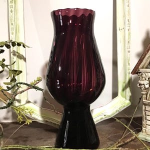 Purple vase with swirl design, black glass base and purple swirl, vase, vase with swirl