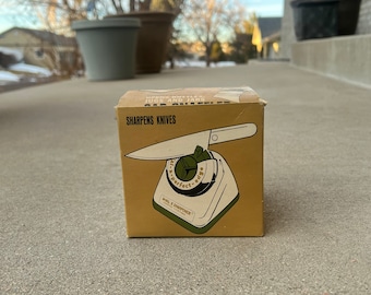 Green and White Knife Sharpener in Original box