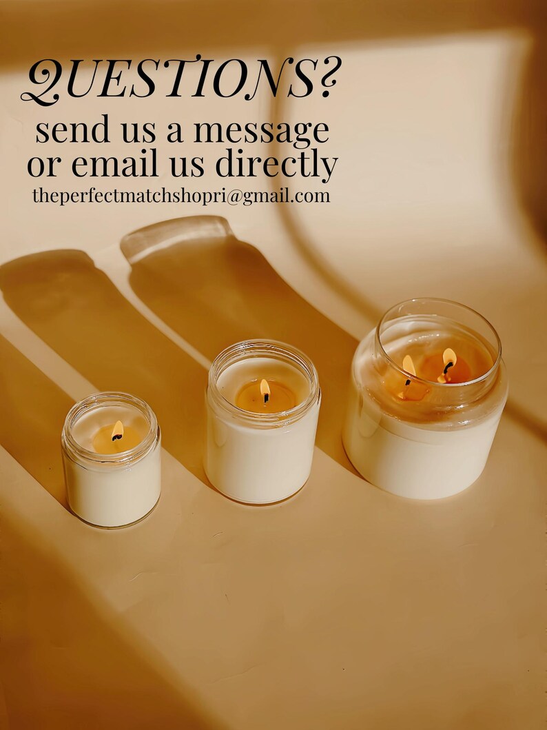 three candles sitting on top of a table next to each other