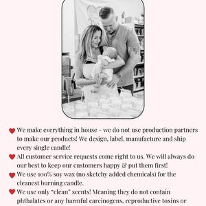 a man and woman holding a baby in their arms