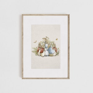 May include: A watercolor illustration of four brown rabbits, three of them wearing red jackets and one wearing a blue jacket, standing in a circle around a fifth rabbit wearing a blue dress. The rabbits are surrounded by green ferns and white flowers.