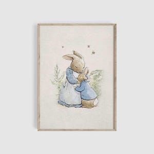 May include: A watercolor illustration of two rabbits hugging in a field. The mother rabbit is wearing a blue dress and the baby rabbit is wearing a blue jacket. The background is a light green and brown.