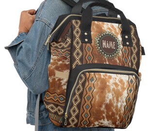 Mochila de pañales con estampado de cuero de vaca monograma / bolsa de bebé personalizada de estilo occidental / bolsa de pañales del suroeste / bolsa de piel de vaca sintética / indio tribal