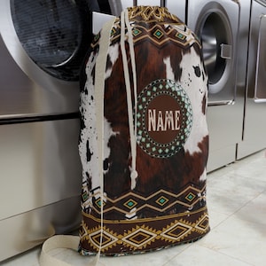 Monogrammed Western Cowhide Print Laundry Bag | faux cow print clothes bag | personalized laundry tote | customized southwestern hamper bag
