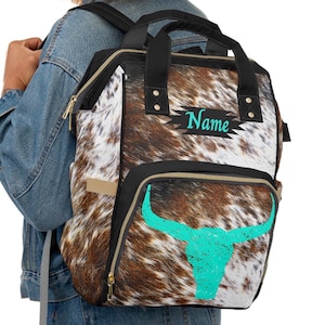 Personalized Cowhide Print Diaper Backpack | custom cow print baby bag | western longhorn travel bag | monogrammed backpack | cowgirl bag