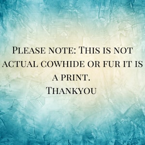 May include: Text on a blue and yellow textured background that reads: "PLEASE NOTE: THIS IS NOT ACTUAL COWHIDE OR FUR IT IS A PRINT. THANKYOU"
