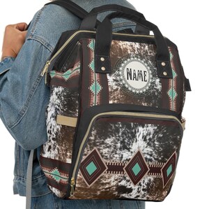 Personalized Cowhide Print Diaper Backpack | custom western baby bag | new mom gifts | monogrammed diaper bag | cow print backpack | cowgirl