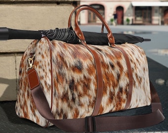 Cowhide Print Waterproof Travel Bag | faux cowhide luggage bag | western cowhide weekender bag | cowgirl gift | western cowboy duffel bag
