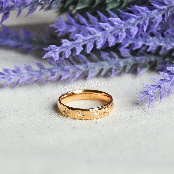 Gold Nordstern Ring: CZ Starburst auf Edelstahl Bandring