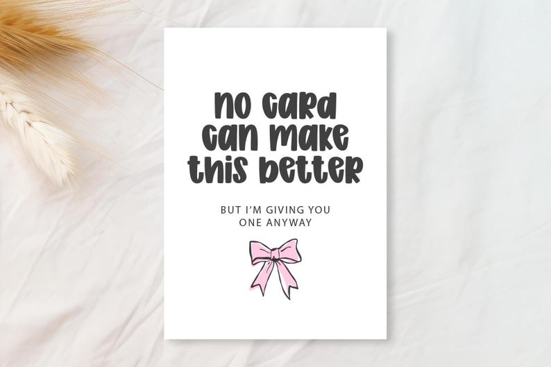 Minimal greeting card on soft fabric flatlay featuring the Jelly Puff cute chunky handwritten font in dark gray with a small pink bow illustration. Playful, readable all-caps mix-case display for cards and prints.