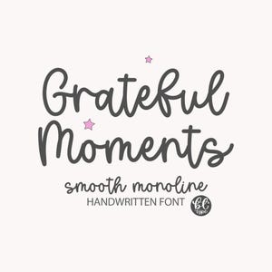 May include: A light beige background with the words "Grateful Moments" in a dark grey, handwritten font. Below, the text "smooth monoline HANDWRITTEN FONT" is displayed. Pink star illustrations are also present.