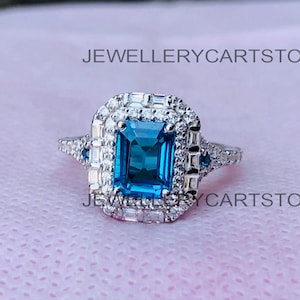 Enchanted Disney Cinderella London Blue Topaz and 3/4 CT. Diamond Double Frame Engagement Ring in 14K White Gold Over Sterling Silver, 6308