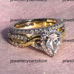 Enchanted Disney Rapunzel 1 1/4 CT T.W. White Pear Diamond Twist Shank Engagement Ring Set Stering Silver Two-Tone Rhodium Bridal Ring Set