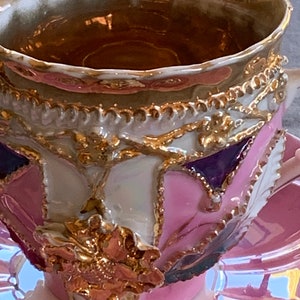 Victorian 19th c. Hand Painted Iridescent Porcelain Teacup and Saucer, Signed.  Made in Germany