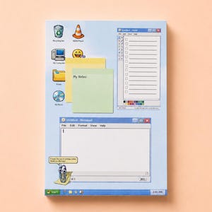 May include: A rectangular notepad featuring a retro computer desktop interface design. The light blue background displays classic icons, a Paint window with a checklist, a Notepad window, and a paperclip character with the text It looks like you're writing a letter. Would you like help?