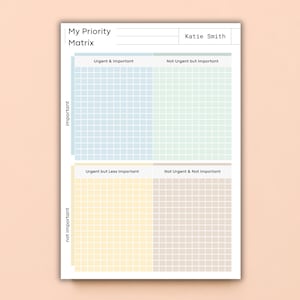 May include: A rectangular priority matrix planner sheet with the text My Priority Matrix and Katie Smith. The grid is divided into four colored sections: blue for Urgent & Important, green for Not Urgent but Important, yellow for Urgent but Less Important, and beige for Not Urgent & Not Important.