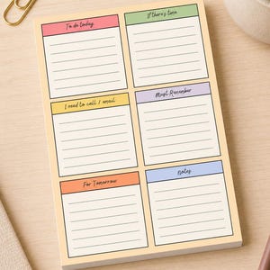May include: A rectangular notepad with a light peach background featuring six distinct sections with colored headers. The headers read To do today, If there's time, I need to call / email, Must Remember, For Tomorrow, and notes, each with lined space.