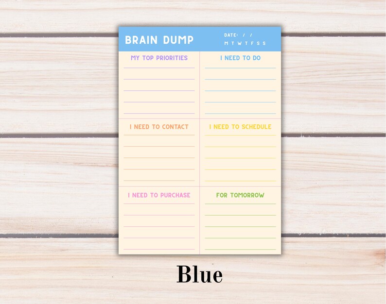 May include: A rectangular paper planner sheet with a light blue header labeled BRAIN DUMP and a date section. The cream-colored body features six categorized sections with lines for writing: MY TOP PRIORITIES, I NEED TO DO, I NEED TO CONTACT, I NEED TO SCHEDULE, I NEED TO PURCHASE, and FOR TOMORROW.
