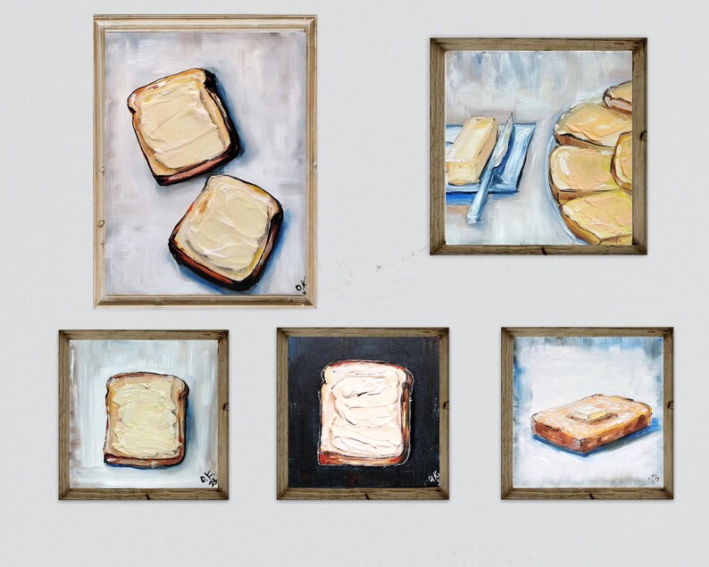 May include: Five framed paintings of toast with butter. The paintings feature various compositions, including two slices of toast, a single slice, and a plate of toast. The artwork uses a palette of warm browns, yellows, and whites.